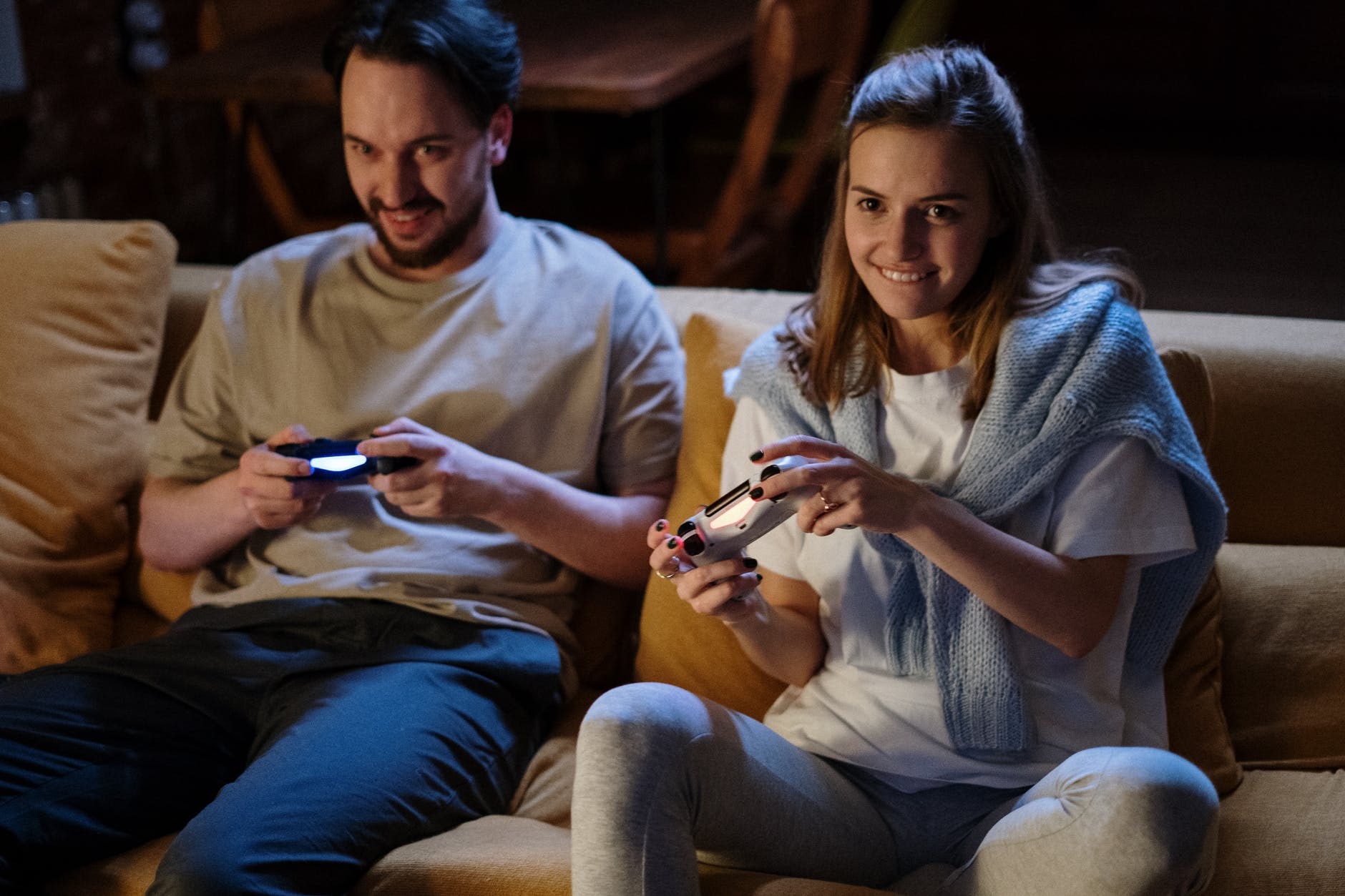Couple on couch gaming