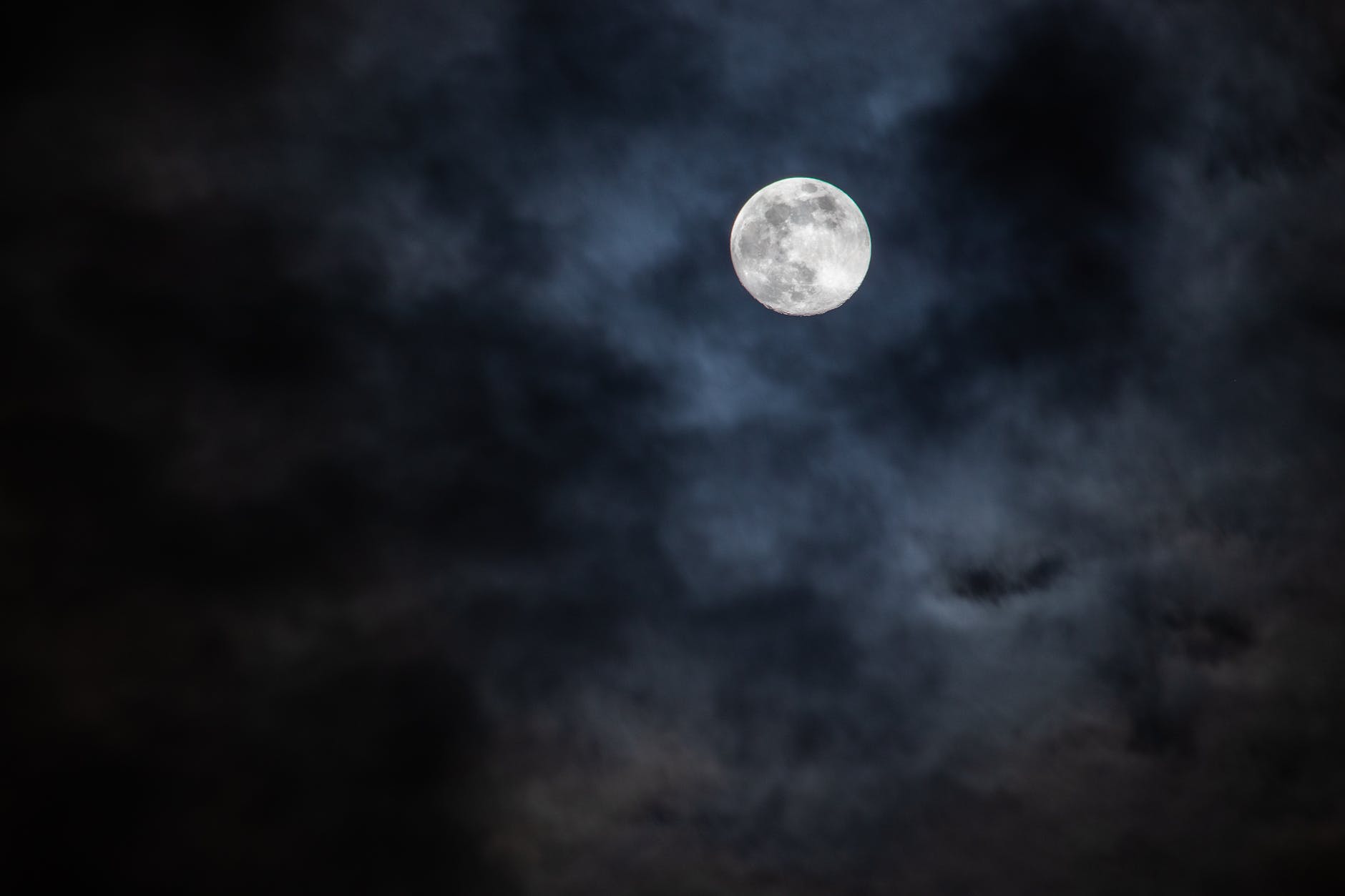 Moon in a cloudy sky